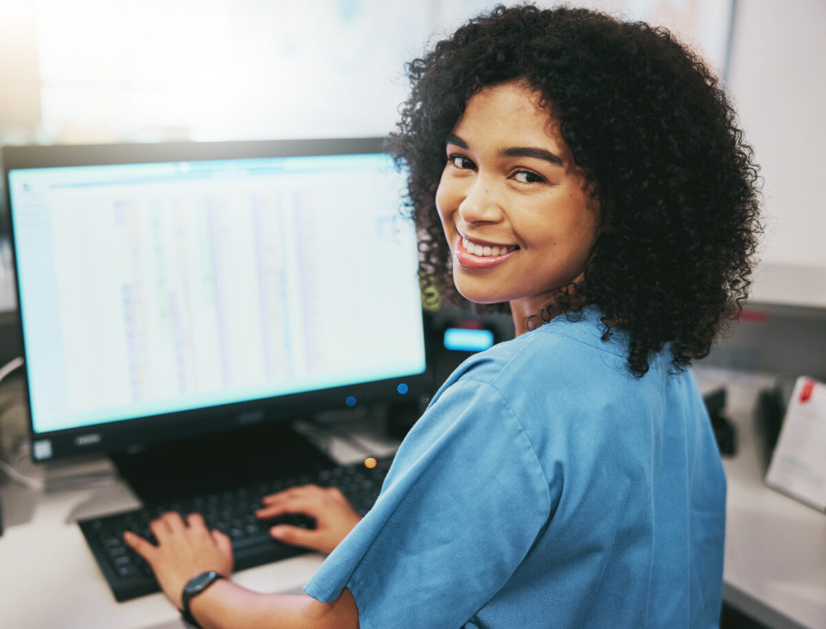 Healthcare worker using eMAR for medication administrations.
